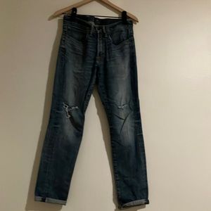 Dark washed distressed Lucky jeans